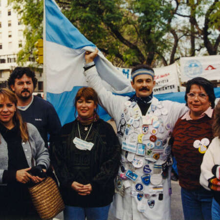 <p><em>Autoconvocados</em> (self-organised protestors) from Corrientes province, in Buenos Aires' Plaza de Mayo. Argentina has a rich tradition of autonomous worker movements who eschew formal affiliations with unions or political parties, yet can successfully mount sustained popular protests around shared concerns. <br /></p>
<p>In these protests in 1999, a diverse front of teachers, state employees, farmers, pensioners, healthcare workers, small business owners, transport workers, and the un(der)employed organised months-long demonstrations against government corruption, unpaid wages, and diminishing quality of life in their province. Using tactics such as strikes, roadblocks, <em>escraches</em> (loud demonstrations outside the homes of targeted individuals), and mass marches, they amplified their call for reforms. Six months in, the Corrientes <em>autoconvocados</em> had even brought their protests to the national capital. <br /></p>
<p>Their concerns and protests were an early indicator of the grim politico-economic meltdown that was about to ravage the entire country. </p>