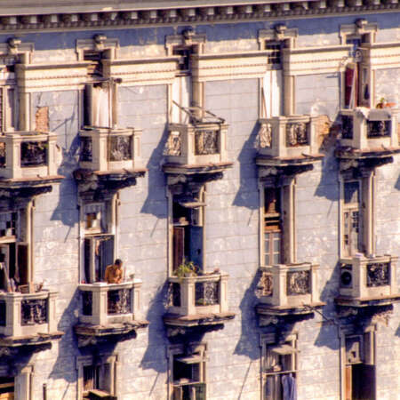 <p>A man on a balcony in central Havana.</p>