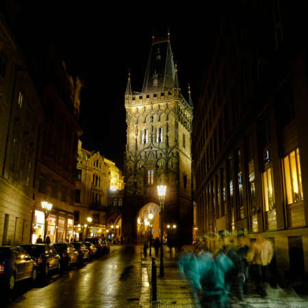 <p>A night scene in Prague's historic centre. The tower is the Prašná brána, or Powder Tower, a 15th Century gate in the city walls.</p>