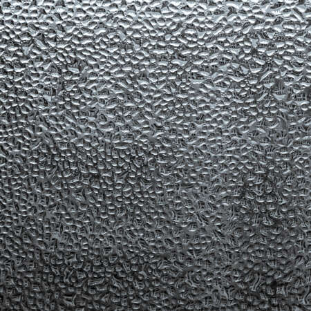 <p>Buildings refracted through droplets of condensation in a window create a kaleidoscope.</p>