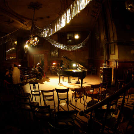 <p>The warm and well-worn interior of the Spiegelsaal at Clärchens Ballhaus, a beloved venue in Berlin.</p>