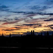 <p>A view over Munich. Shot from the Monopteros in the Englischer Garten park, the city's skyline is punctuated by church spires.</p>