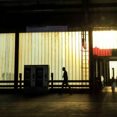 <p>Golden hour and some dirty plate glass windows make for a dramatic train platform.<br /></p>