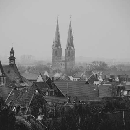 <p>A view over the rooftops of Quedlinburg on a winter morning.</p>