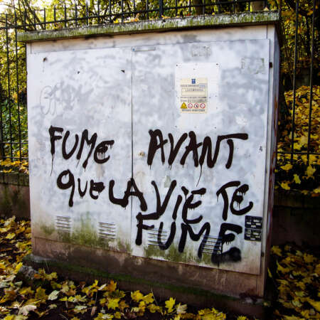 <p>'Smoke before life smokes you'. A healthy dose of nihilism on an electric box.</p>