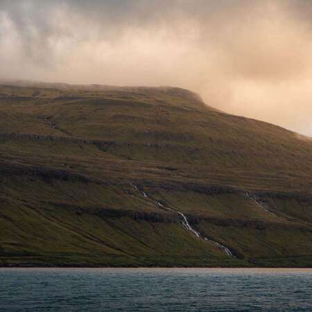 <p>A sunrise view across the fjord looking toward the island of Eysturoy.</p>