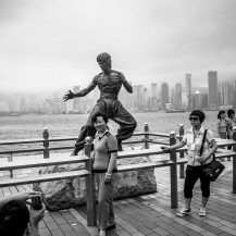 <p>People gather around a statue of Hong Kong film idol Bruce Lee. <br /></p>