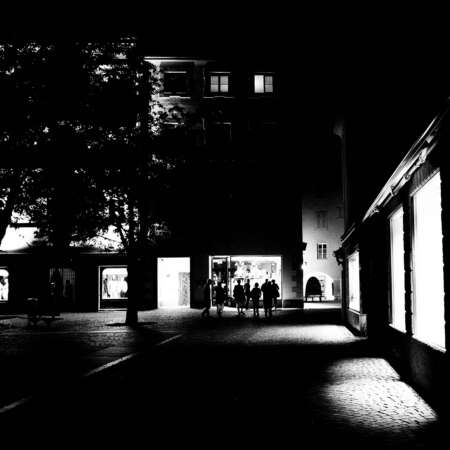 <p>A group enjoying a spot of window shopping on a quiet night in Bressanone.</p>