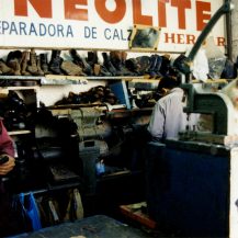 <p>Two Mexico City cobblers in their uniquely decorated workshop. <br /></p>