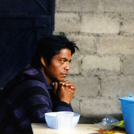 <p>A man thinks while drinking pulque, a traditional Mesoamerican indigenous drink made from the maguey plant.</p>