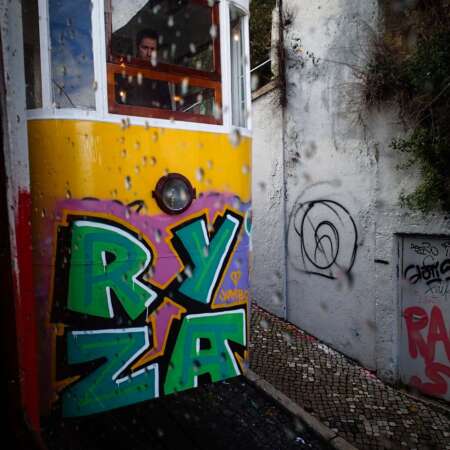 <p>A passing glance at one of Lisbon's hill-climbing trams.</p>
