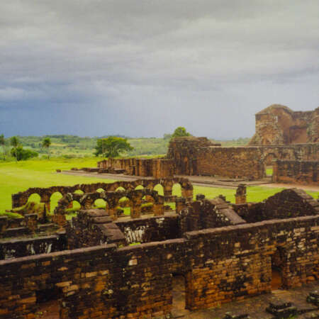 <p>Storm clouds arrive at la Santísima Trinidad de Paraná, one of the Jesuit <em>reducciónes</em> (missionary colonies) built in this region during the 17th and 18th Centuries. They fell into ruin when the Jesuits were expelled by Spain in 1767. </p>
