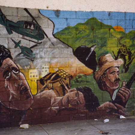 <p>A mural in San Salvador depicts the suffering and scale of the 1979-1992 civil war that had concluded in a peace agreement just a few years earlier.</p>