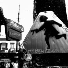 <p>A mock road sign comments on U.S. gun culture.</p>