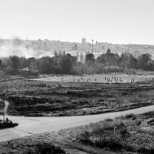 <p>Smoke and soccer in Soweto.</p>